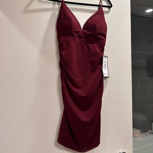 I bought for a wedding — never worn!
